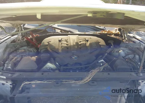 2013 BMW 750Li из США, поврежденный, VIN WBAYE8C50DD133041